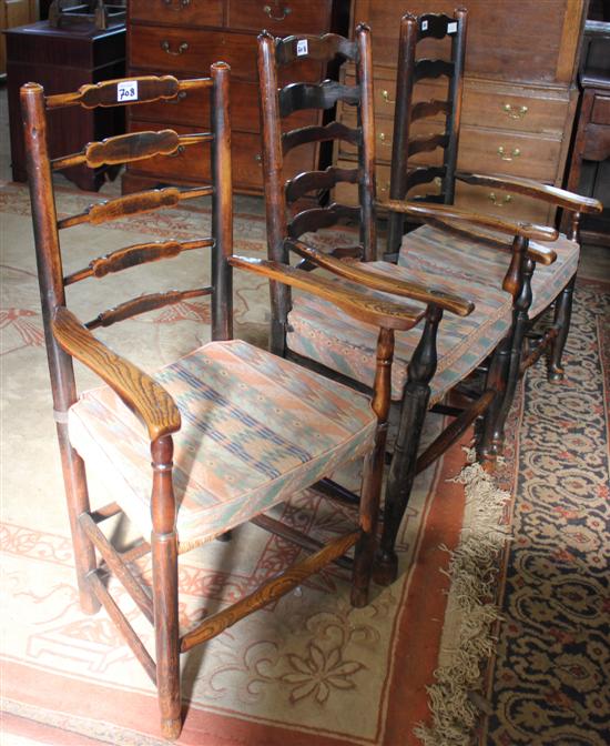 Three ladderback elbow chairs